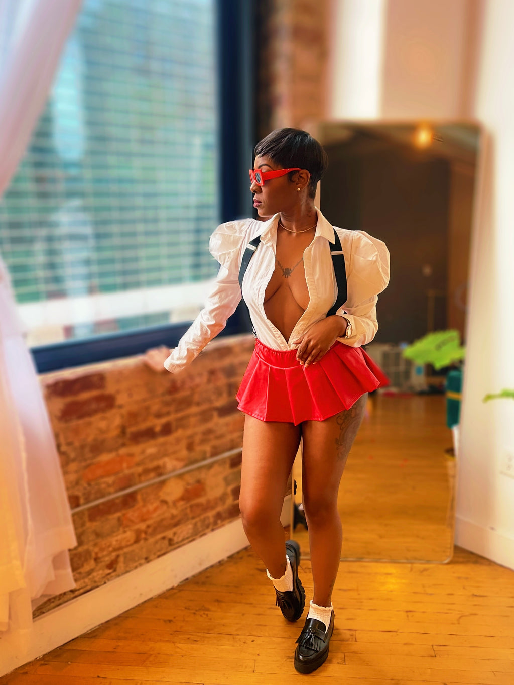 “Ms. Flirty” Pleaded Faux Leather Skirt